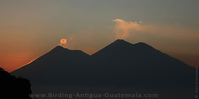 Smoky mountains: sun set upon Fuego and Acatenango volcanoes.